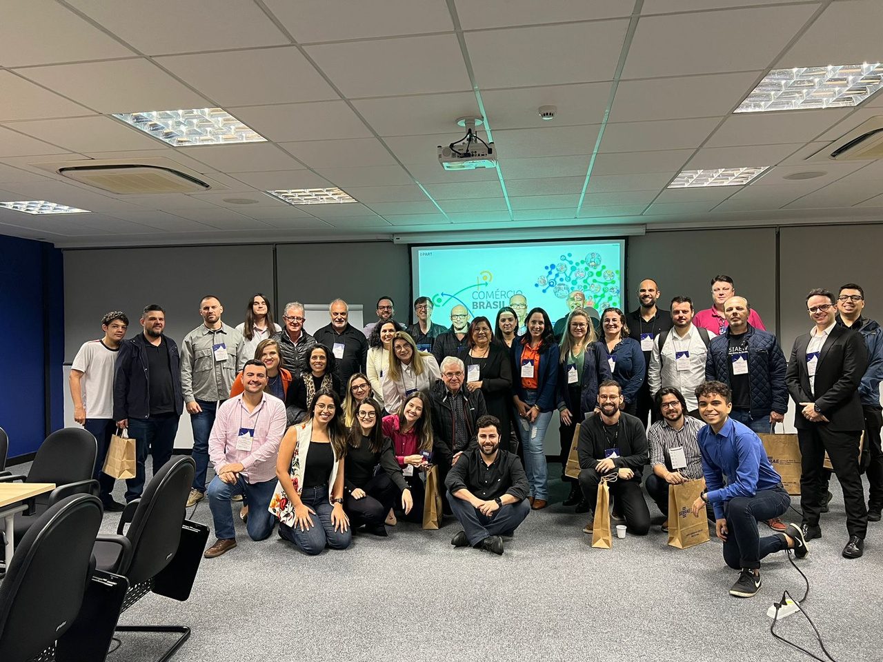 Participantes reunidos após a rodada